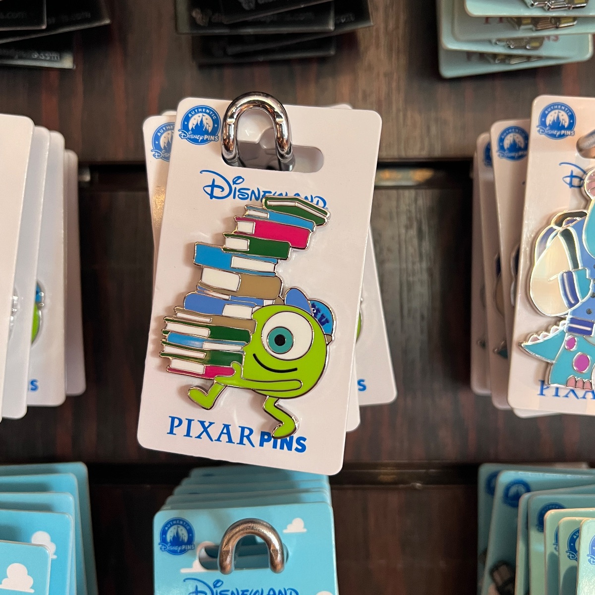 Disneyland Paris Monsters University Mike Wasowski Book Pile Pin view 1